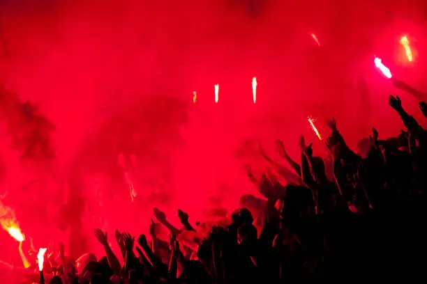 Photo of Football fans lit up the lights, flares and smoke bombs