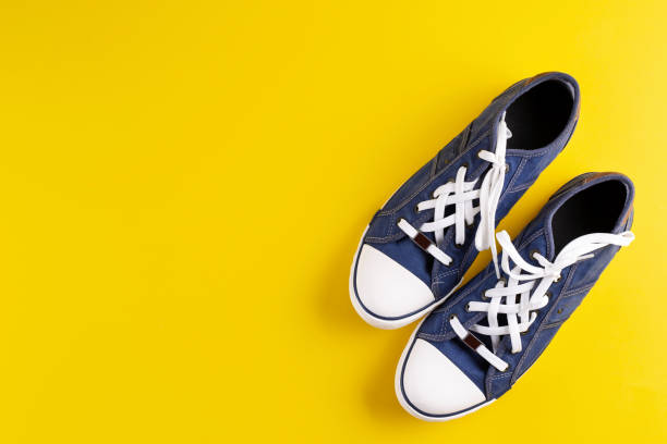 istock New men's sneakers on a bright background. spring shoes. 1126939249