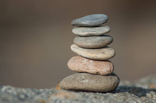 istock stone balance on rock in border river 1126939564