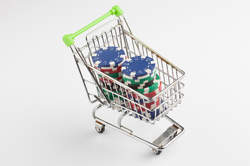 shopping trolley and gambling chip