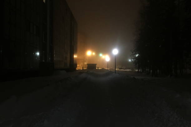 istock Night city lights in fog, at night 1126942644