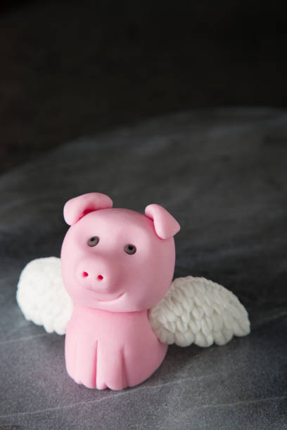 figurine for cake from mastic. piggy