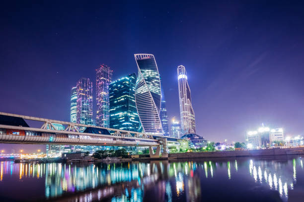 Moscow skyscrapers on the river-Moscow with night illumination of the city summer night