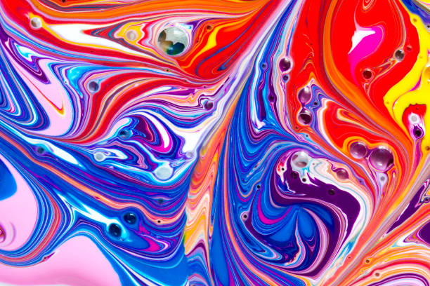 istock Abstract background of multicolored paint swirls 1126952870