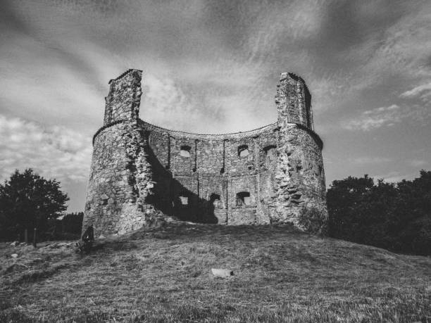 istock old ruined stone tower, black and white color 1126956499