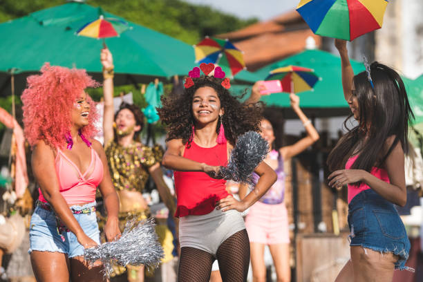 istock Young people dancing at street carnival 1126957544