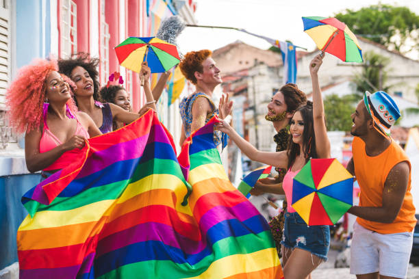 istock Young people dancing at street carnival 1126957545