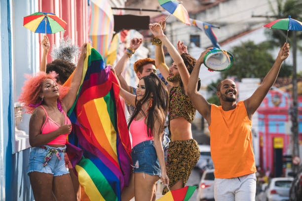 istock Young people dancing at street carnival 1126957659