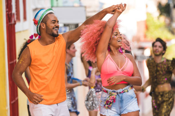 istock Young people dancing at street carnival 1126957817