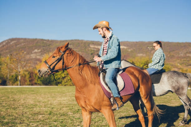 istock Couple horse riding 1126961323