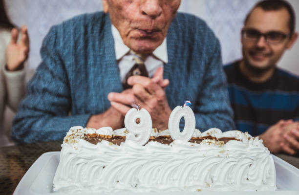 istock Senior man celebrates birthday 1126967665
