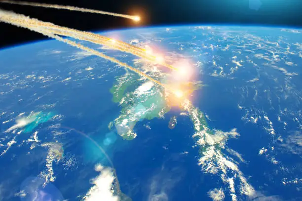 Photo of Meteorite falling from space over island Cuba, explosion in the atmosphere. Elements of this image furnished by NASA