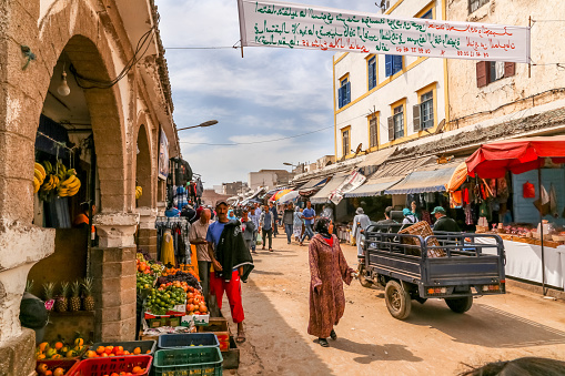 Essaouira, Morocco - September 30, 2014: Local moroccan people at traditional market or bazaar in Essaouira, Morocco, Africa
