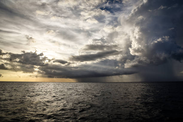 istock Storm Clouds Coming In at Sunset & Dusk 1126970419