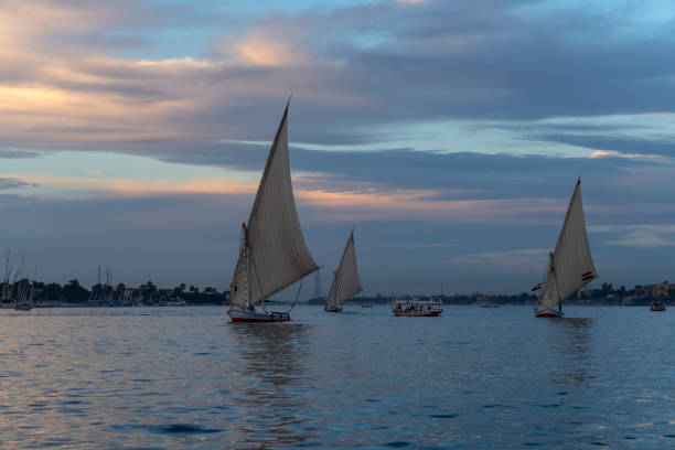 istock Arabic Feluccas on the river Nile at Luxor 1126973004