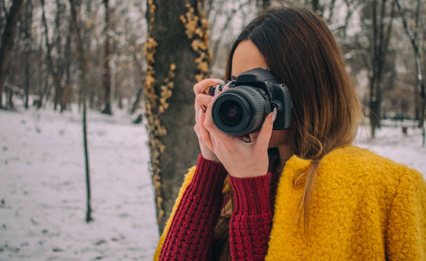 istock Young woman photographing 1126977314
