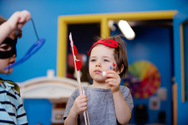 istock Children and educator preparing Valentine's day 1126977404