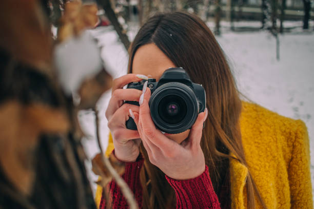 istock Woman photographing 1126980394