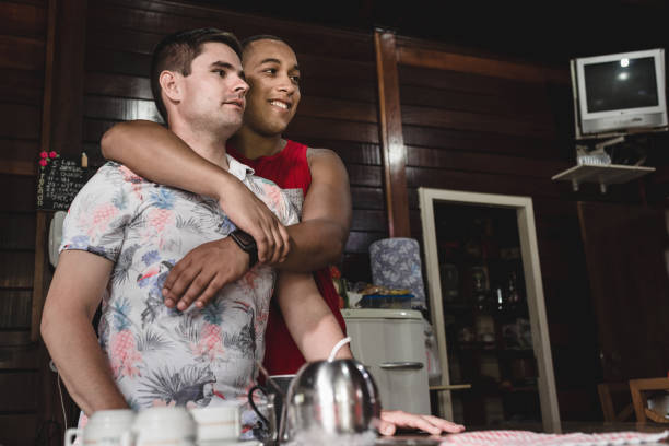 istock Homosexual couple in the kitchen 1126981635