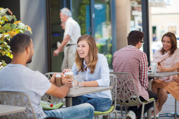 istock People in a street caffe 1126988001