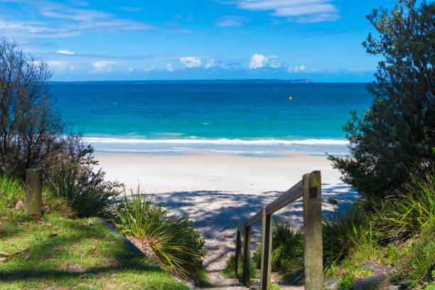 Beach water view in the city of Huskisson, NSW, Australia, a small coastal town well known as gateway to Jervis Bay area Beach water view in the city of Huskisson, NSW, Australia, a small coastal town well known as gateway to Jervis Bay area shoalhaven stock pictures, royalty-free photos & images