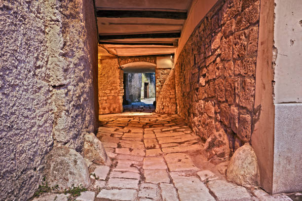 Vodnjan, Istria, Croatia: picturesque old alley and underpass in the medieval town near Pula