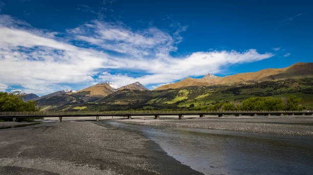 istock Bridge over a braided river in Glenorchy 1127005772