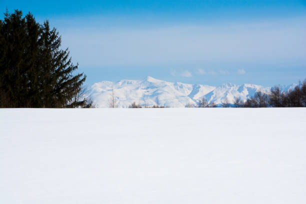 istock Snowy field and snowy mountains Mt.Tokachi 1127005903