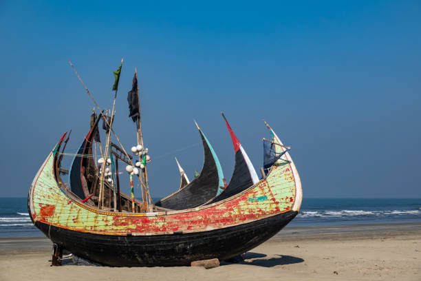 istock fishing boat on the beach 1127006826