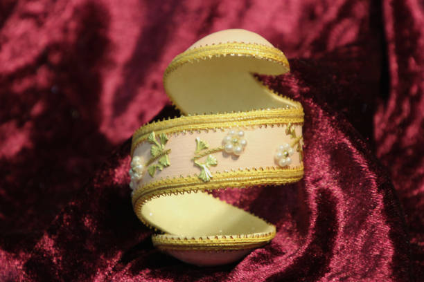 istock Pink Carved Egg with Pearl Flowers 1127009078