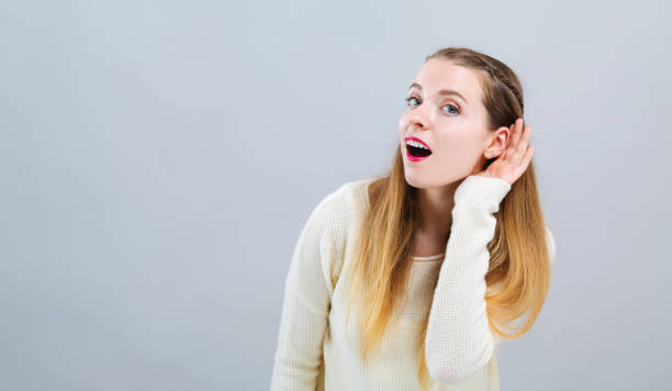 istock Young woman listening 1127011367