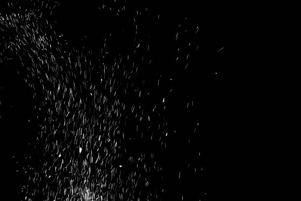 istock black and white fire sparkle on white background without fine focus 1127012264
