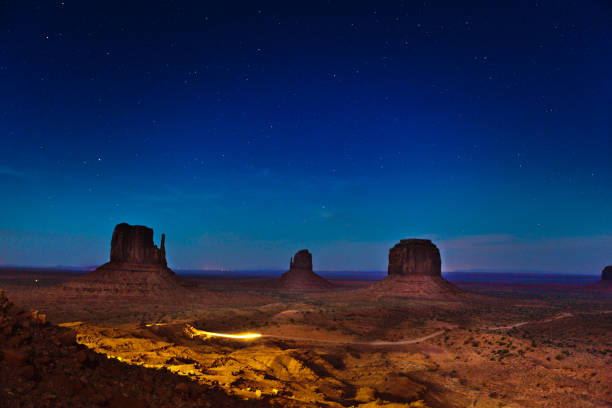 istock Monument Valley Tribal Park Landscape in Night Sky 1127014621