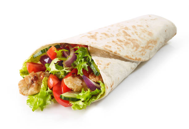 istock Tortilla wrap with fried chicken meat and vegetables 1127015540