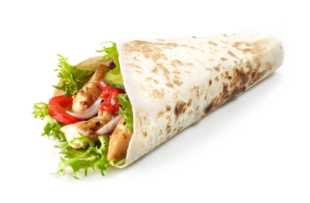 istock Tortilla wrap with fried chicken meat and vegetables 1127015550