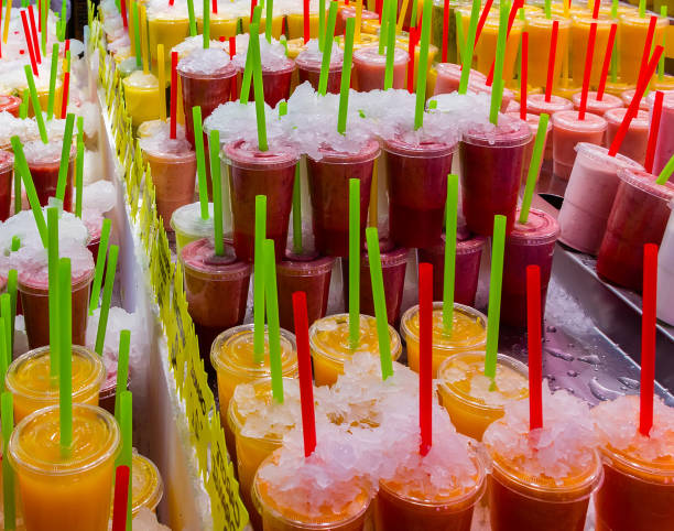 istock Tropical juice fruits drinking straws 1127018383