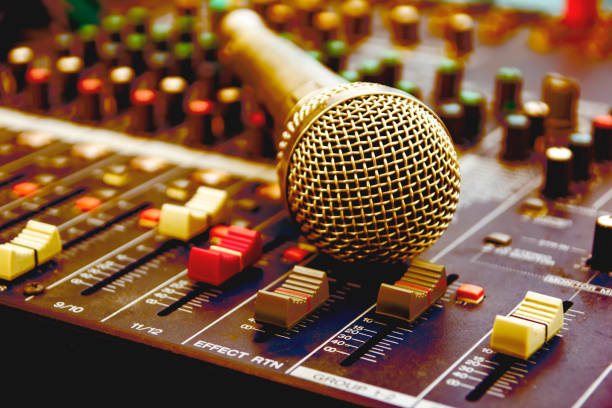 istock Microphone with audio mixer in the control room audio system. 1127019367
