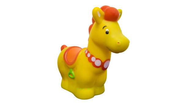 istock toy rubber horse yellow 1127020844
