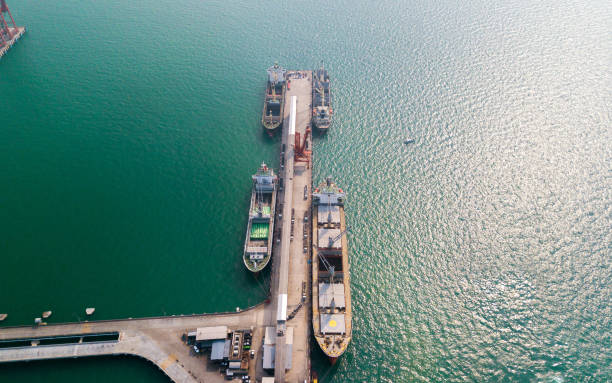 istock Aerial view of container ship in import - export business industry 1127021033