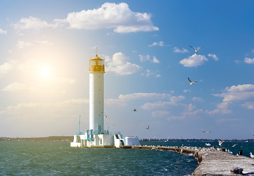 Spring sunset  Lighthouse in Odessa harbor Ukraine