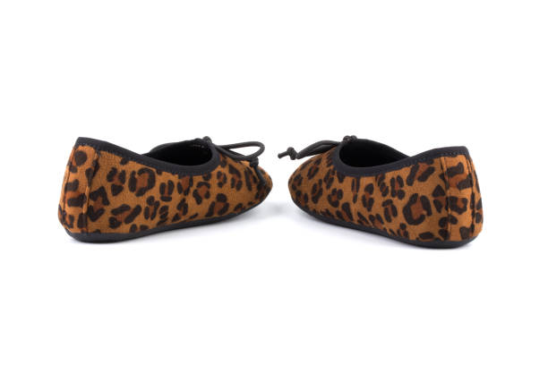 istock Small Child Shoes On White 1127023980