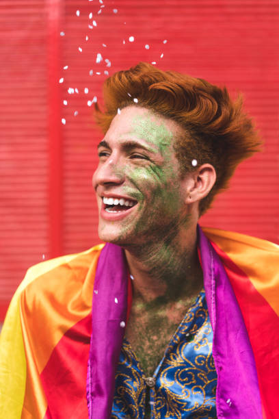 Man smiling in the rain of confetti
