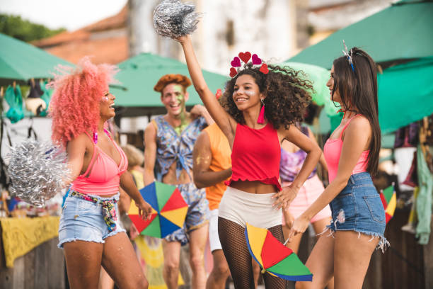 Young people dancing at street carnival Olinda, Brazil, Carnival - Celebration Event, Traveling Carnival, Day latin music photos stock pictures, royalty-free photos & images