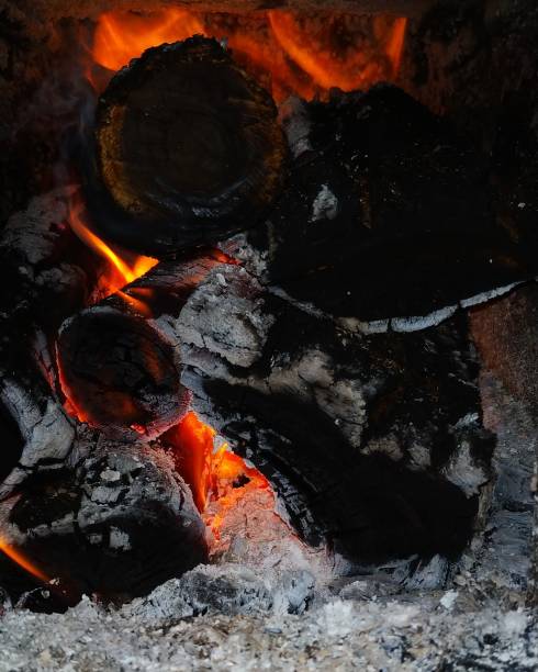 istock Firewood in the stove 1127026474