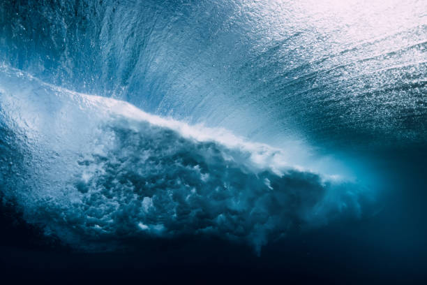 istock Barrel wave underwater with air bubbles. Ocean in underwater 1127028082