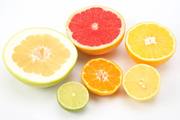 istock cut pieces of different citrus fruits on white background 1127028683