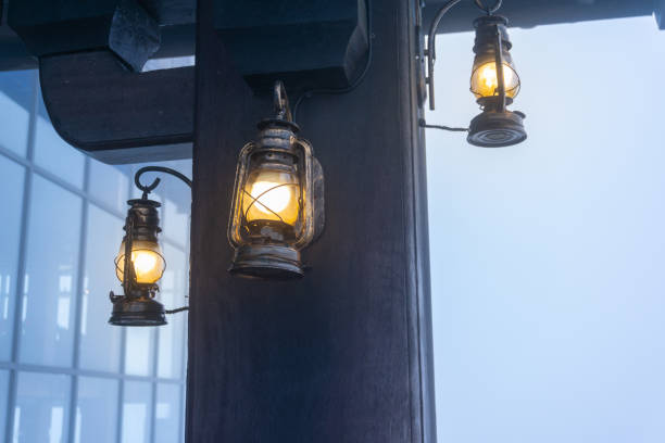 istock Vintage bulb lamp outside of restaurant bar in mist 1127034049