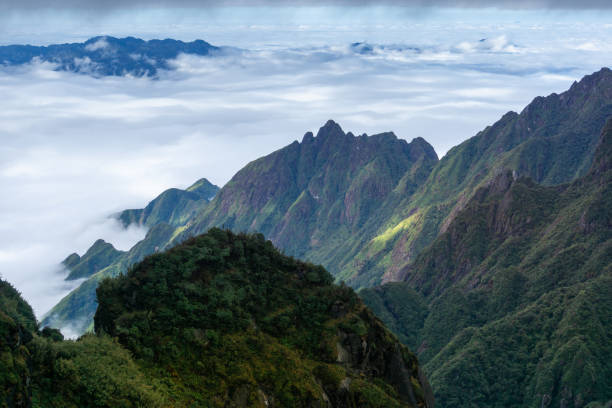 istock Mountain with clouds in Sapa town, southern Vietnam 1127034609
