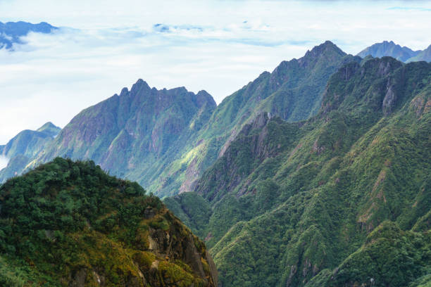 istock Mountain with clouds in Sapa town, southern Vietnam 1127034621