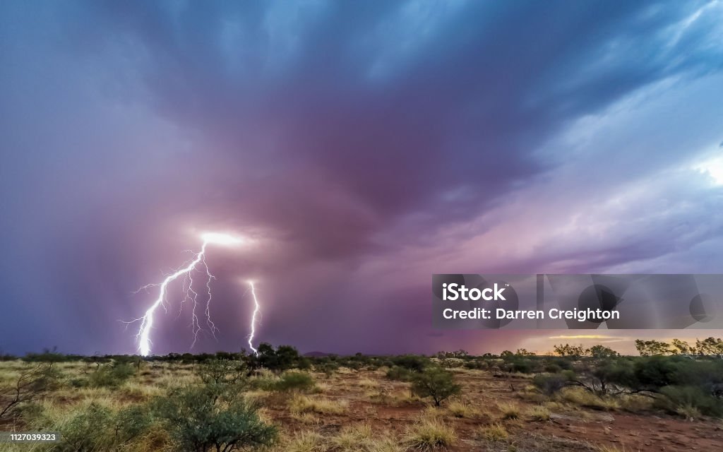 Huge Australian electrical storm A huge Australian electrical storm in the Pilbara outback Storm Stock Photo